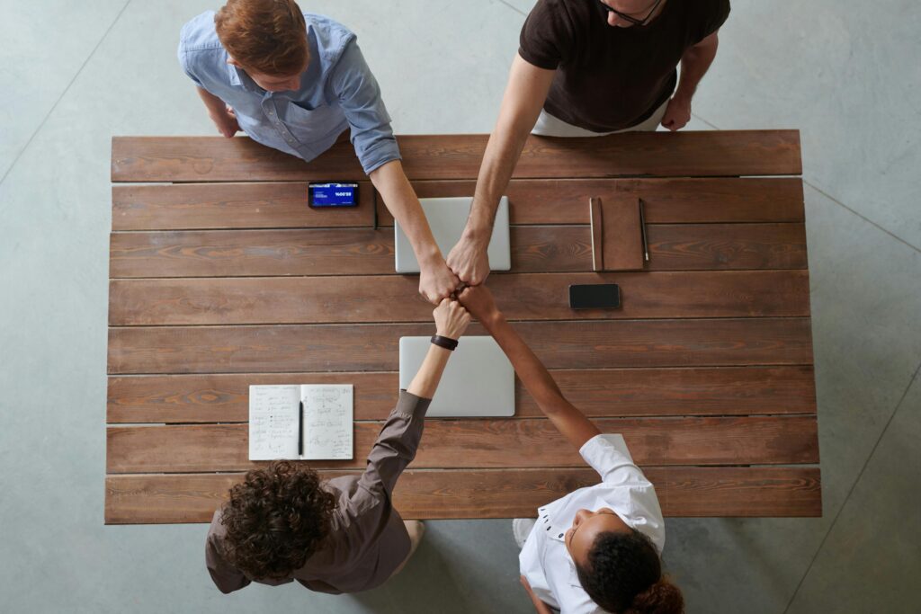 celebration Kanthos Standards in food supplements A diverse group of professionals engaging in a teamwork celebration Kanthos Standards in food supplements